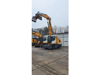 Pelle sur pneus Liebherr LH22 M: photos 3