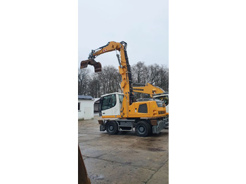 Pelle sur pneus Liebherr LH22 M: photos 2
