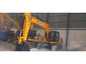 Pelle sur chenille JCB JS210LC