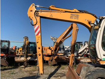 Pelle sur pneus Liebherr A 312: photos 4