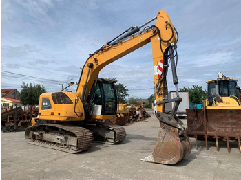 Pelle sur pneus Liebherr R 914 Compact Litronic: photos 2