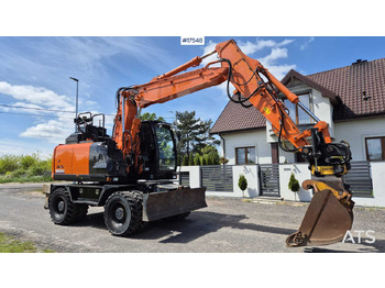 Pelle sur pneus HITACHI ZX140W-6