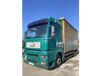 Camion à rideaux coulissants MAN TGA 18.310
