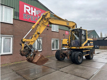 Pelle sur pneus Caterpillar M315 +ROTO CE: photos 2