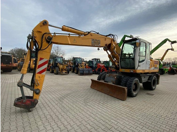 Pelle sur pneus Liebherr A 900 C Litronic: photos 4