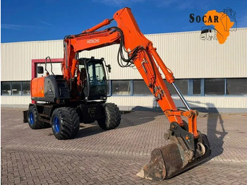Pelle sur pneus HITACHI ZX140W-3