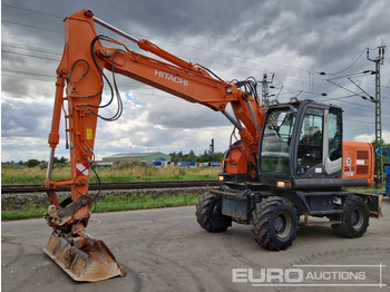 Pelle sur pneus HITACHI ZX140W-3