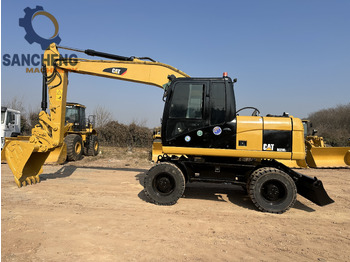 Pelle sur pneus CATERPILLAR M320D2: photos 2