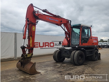 Pelle sur pneus VOLVO EW140