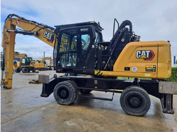 Pelle sur pneus CATERPILLAR MH3024