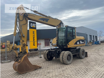 Pelle sur pneus CATERPILLAR M316C