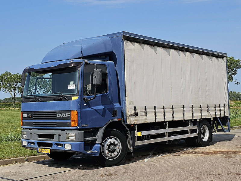 DAF 65.180 MANUAL NL-TRUCK - Camion à rideaux coulissants: photos 2 DAF 65.180 MANUAL NL-TRUCK - Camion à rideaux coulissants: photos 2