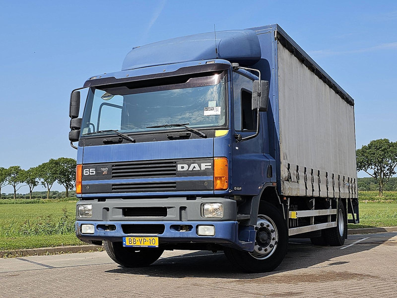 DAF 65.180 MANUAL NL-TRUCK - Camion à rideaux coulissants: photos 1 DAF 65.180 MANUAL NL-TRUCK - Camion à rideaux coulissants: photos 1