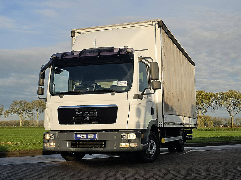 MAN 8.180 TGL - Camion à rideaux coulissants: photos 1 MAN 8.180 TGL - Camion à rideaux coulissants: photos 1