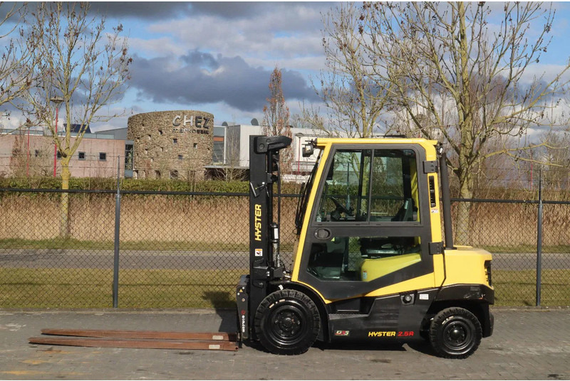 Hyster H2.5 A | BOOM SUSPENSION | SIDESHIFT | FORK EXTENTIONS | FORK POSITIONERS - Chariot élévateur diesel: photos 1 Hyster H2.5 A | BOOM SUSPENSION | SIDESHIFT | FORK EXTENTIONS | FORK POSITIONERS - Chariot élévateur diesel: photos 1