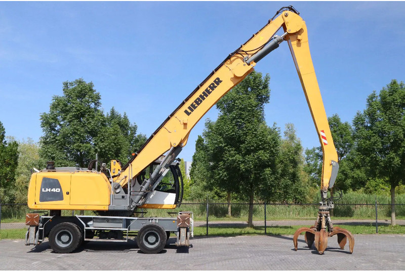 Liebherr LH 40 M LITRONIC | GRAB | QUICK COUPLER | 16 METER - Pelle sur pneus: photos 4 Liebherr LH 40 M LITRONIC | GRAB | QUICK COUPLER | 16 METER - Pelle sur pneus: photos 4