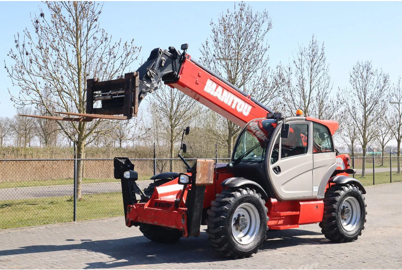 Manitou MT 1440 EASY | AIRCO | HYDR. FORKS - Chariot télescopique: photos 2 Manitou MT 1440 EASY | AIRCO | HYDR. FORKS - Chariot télescopique: photos 2