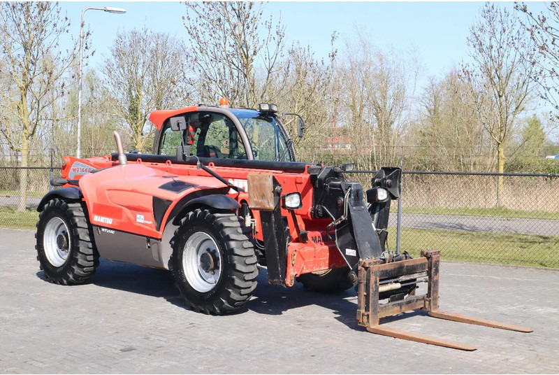 Manitou MT 1440 EASY | AIRCO | HYDR. FORKS - Chariot télescopique: photos 5 Manitou MT 1440 EASY | AIRCO | HYDR. FORKS - Chariot télescopique: photos 5