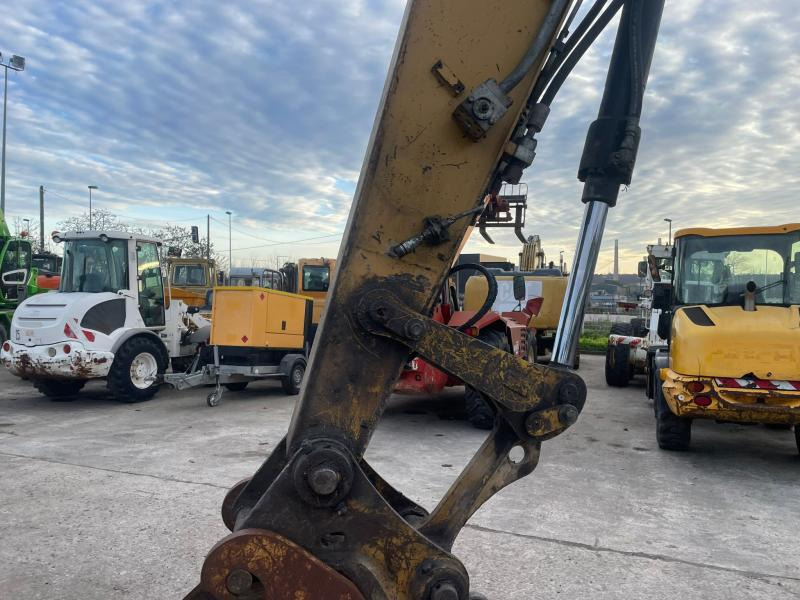 Caterpillar M316 - Pelle sur pneus: photos 3 Caterpillar M316 - Pelle sur pneus: photos 3