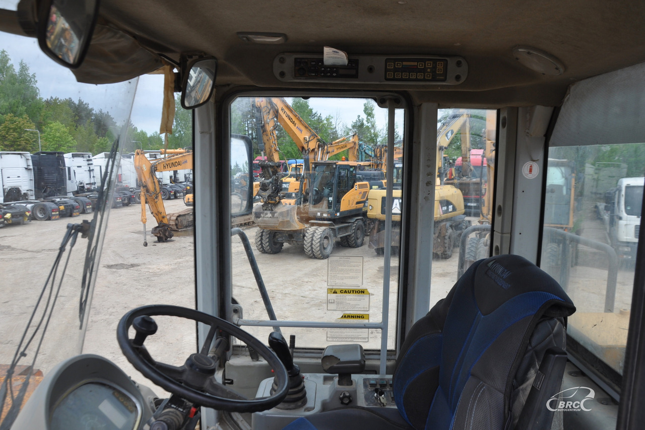Chargeuse sur pneus Hyundai HL770-7: photos 10