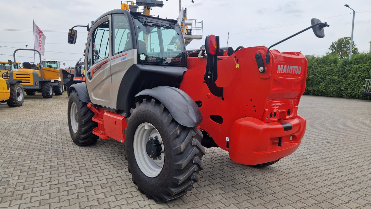 MANITOU MT1440 EASY - Chargeuse sur pneus télescopique: photos 2 MANITOU MT1440 EASY - Chargeuse sur pneus télescopique: photos 2