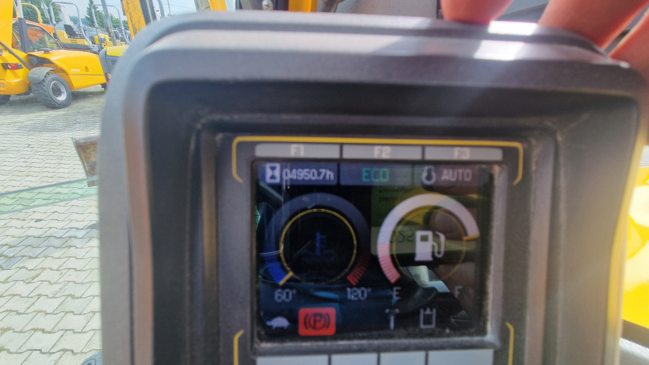 Pelle sur pneus WACKER NEUSON EW65: photos 14