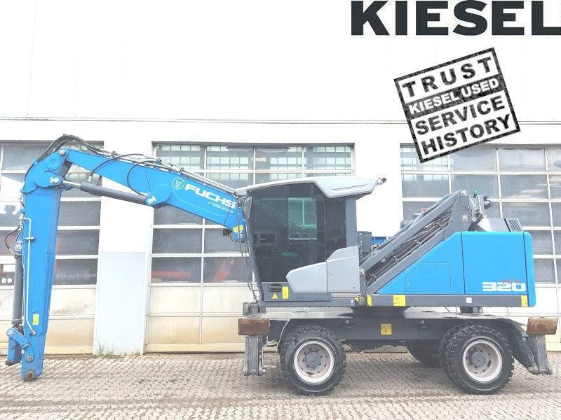 Fuchs MHL 320 F - Pelle de manutention: photos 1 Fuchs MHL 320 F - Pelle de manutention: photos 1