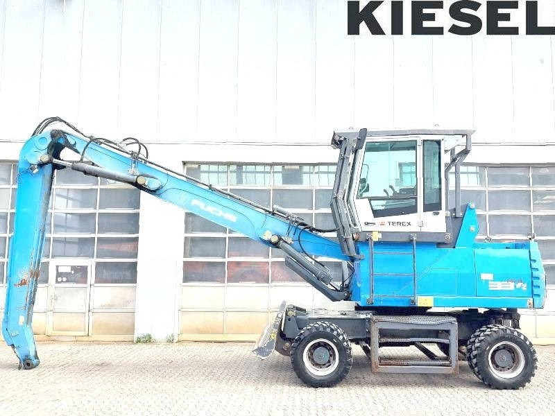 Fuchs MHL 334 E - Pelle de manutention: photos 1 Fuchs MHL 334 E - Pelle de manutention: photos 1
