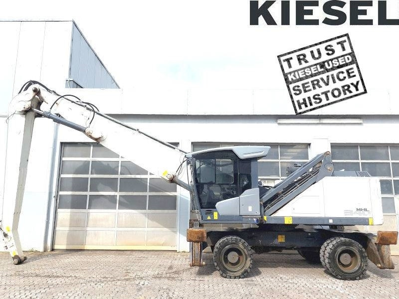 Fuchs MHL 340 F - Pelle de manutention: photos 1 Fuchs MHL 340 F - Pelle de manutention: photos 1