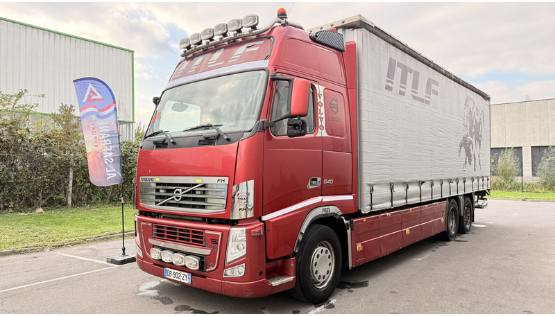 Volvo FH13 540 - Camion à rideaux coulissants: photos 1 Volvo FH13 540 - Camion à rideaux coulissants: photos 1