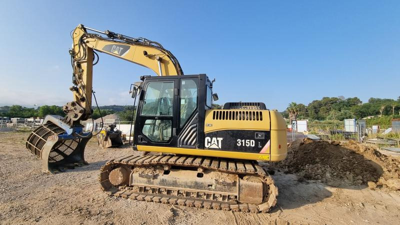Caterpillar 315DL - Pelle sur chenille: photos 1 Caterpillar 315DL - Pelle sur chenille: photos 1