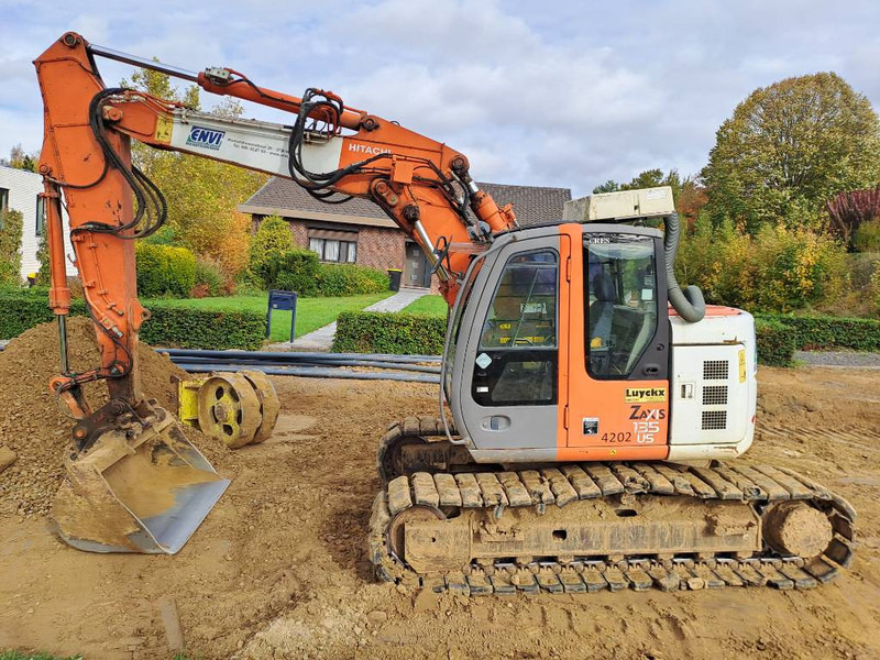 Hitachi ZX135US - Pelle sur chenille: photos 1 Hitachi ZX135US - Pelle sur chenille: photos 1