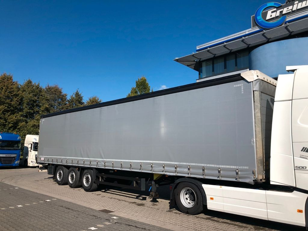 Schmitz Cargobull SD Curtainsider, Coilmulde - Semi-remorque rideaux coulissants: photos 1 Schmitz Cargobull SD Curtainsider, Coilmulde - Semi-remorque rideaux coulissants: photos 1
