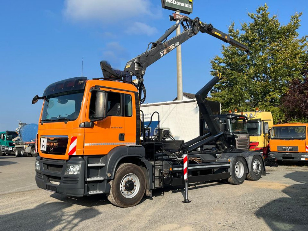 MAN TG-S 26.400 6x4H-2 BL Abrollkipper mit Kran Lift Lenk - Camion ampliroll, Camion grue: photos 1 MAN TG-S 26.400 6x4H-2 BL Abrollkipper mit Kran Lift Lenk - Camion ampliroll, Camion grue: photos 1