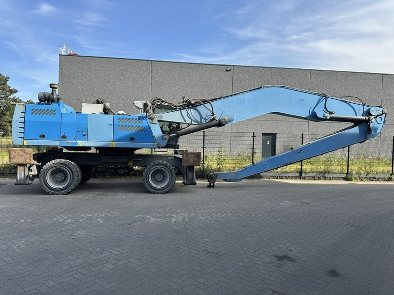 Fuchs MHL 360 OVERSLAGKRAAN / MATERIAL HANDLER / UMSCHLAGBAGGER - TOP ZUSTAND - Pelle de manutention: photos 1 Fuchs MHL 360 OVERSLAGKRAAN / MATERIAL HANDLER / UMSCHLAGBAGGER - TOP ZUSTAND - Pelle de manutention: photos 1