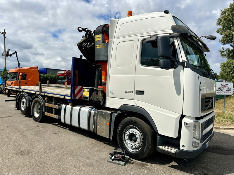 Volvo FH 500 6X2 PRITSCHE + KRAN PALFINGER PK50002 E 6x - RETARDER - PLATFORM 6m20 - TWISTLOCKS 20' - 561.000km - EURO 5 - Camion plateau, Camion grue: photos 1 Volvo FH 500 6X2 PRITSCHE + KRAN PALFINGER PK50002 E 6x - RETARDER - PLATFORM 6m20 - TWISTLOCKS 20' - 561.000km - EURO 5 - Camion plateau, Camion grue: photos 1