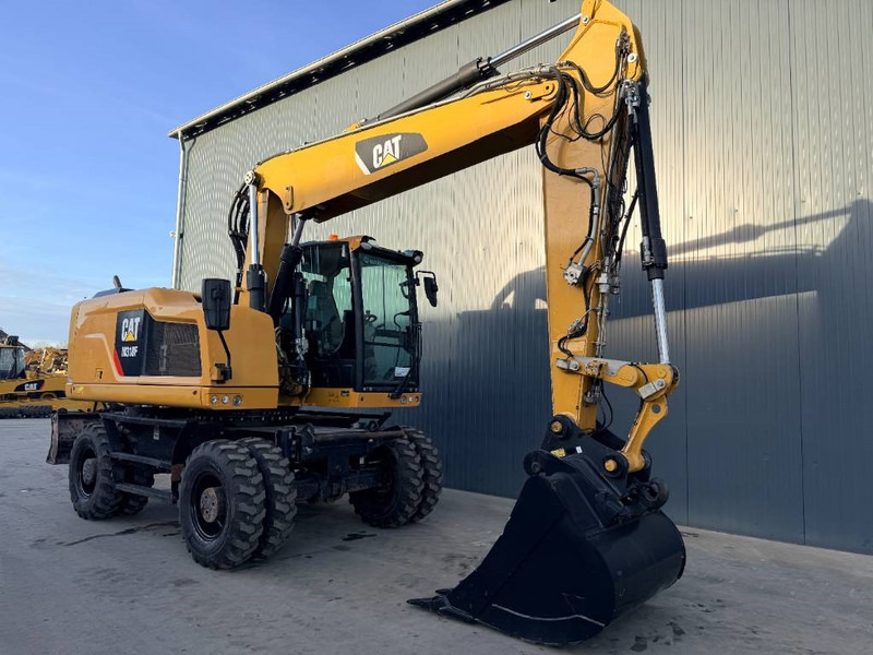 Cat M318F - Pelle sur pneus: photos 5 Cat M318F - Pelle sur pneus: photos 5