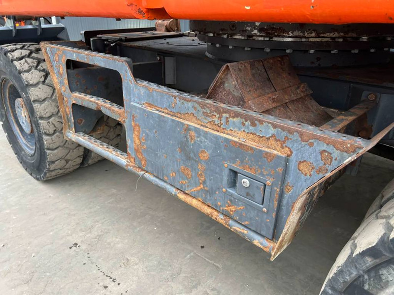 Pelle sur pneus Doosan DX210W: photos 18