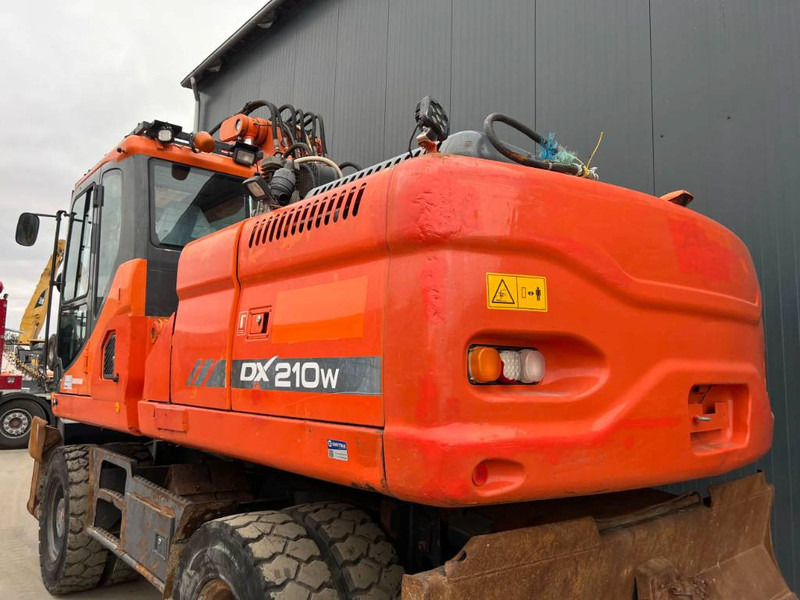 Pelle sur pneus Doosan DX210W: photos 15