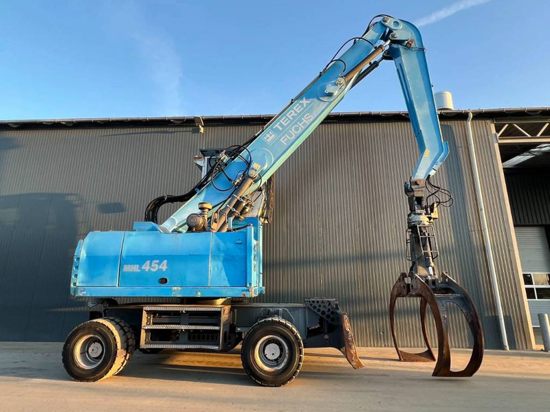Pelle de manutention pour transport de déchets Fuchs MHL454: photos 6