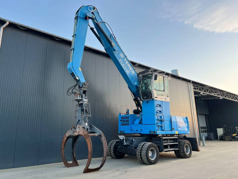 Pelle de manutention pour transport de déchets Fuchs MHL454
