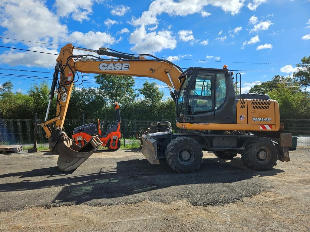 CASE WX 145 - Pelle sur pneus: photos 2 CASE WX 145 - Pelle sur pneus: photos 2