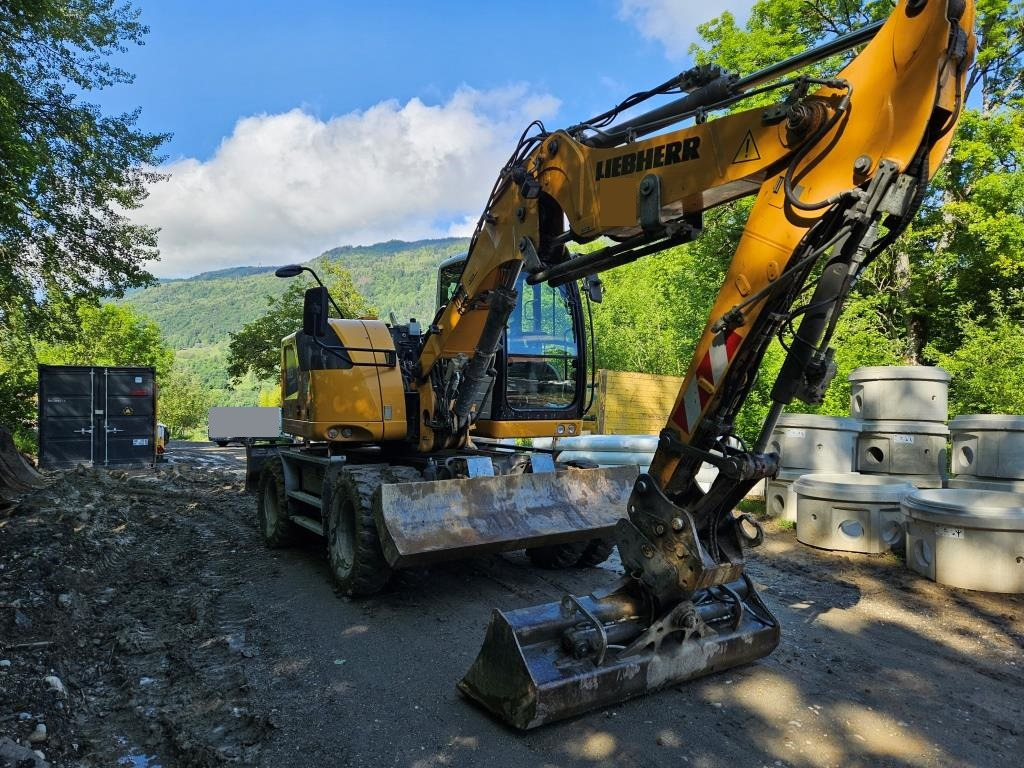 LIEBHERR A 910 - Pelle sur pneus: photos 4 LIEBHERR A 910 - Pelle sur pneus: photos 4