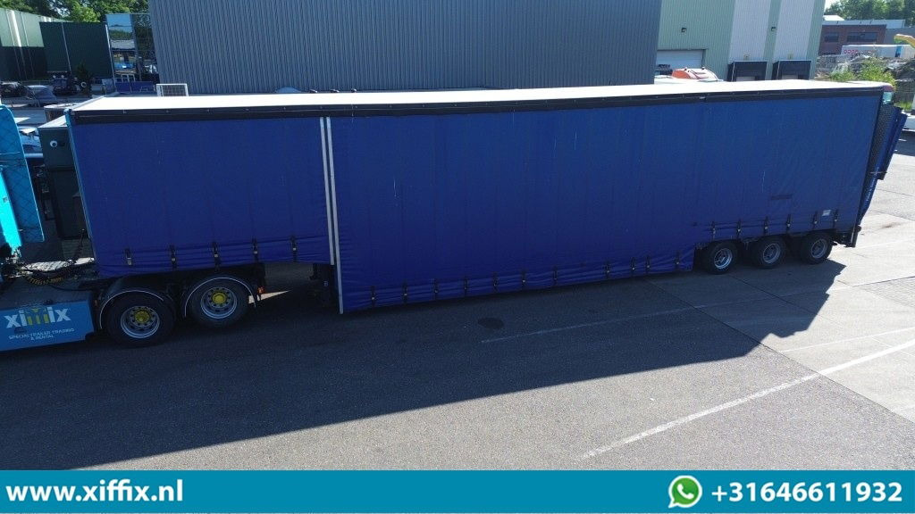 Goldhofer 3-ass. Dieplader met huifopbouw / Hydr. Hefbed en kleppen / 3x gestuur - Semi-remorque surbaissé: photos 1 Goldhofer 3-ass. Dieplader met huifopbouw / Hydr. Hefbed en kleppen / 3x gestuur - Semi-remorque surbaissé: photos 1