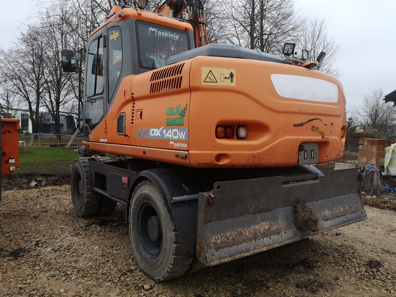 Doosan DX 140 - Pelle sur pneus: photos 2 Doosan DX 140 - Pelle sur pneus: photos 2