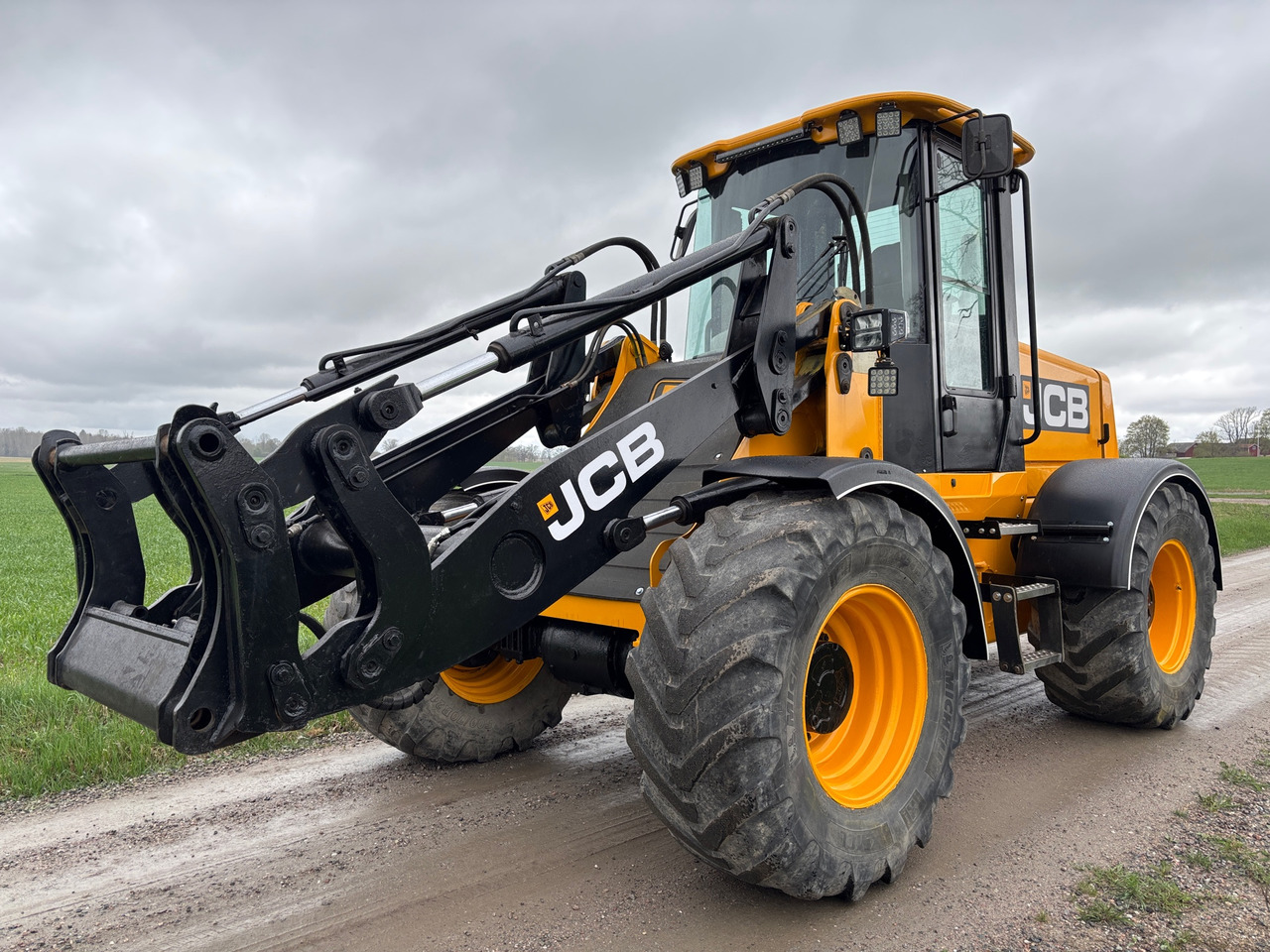 JCB 412 - Chargeuse sur pneus: photos 1 JCB 412 - Chargeuse sur pneus: photos 1