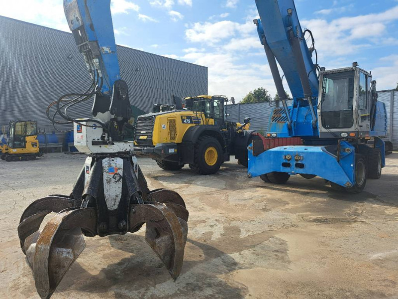 Fuchs MHL360D with low hour engine + grapple - Pelle de manutention: photos 1 Fuchs MHL360D with low hour engine + grapple - Pelle de manutention: photos 1