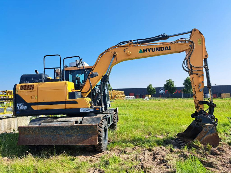 Hyundai HW140 - Pelle sur pneus: photos 4 Hyundai HW140 - Pelle sur pneus: photos 4