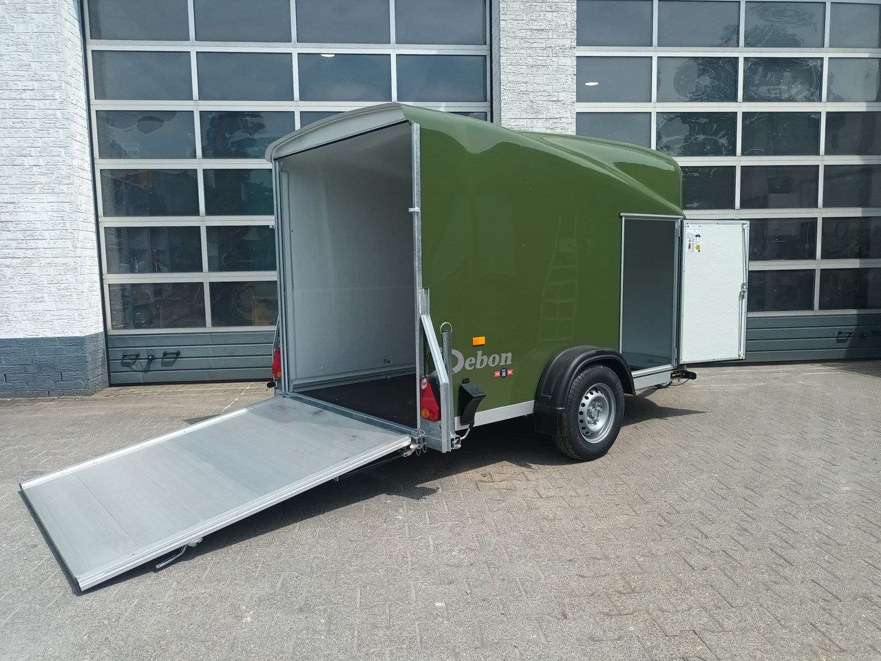 Debon Cargo 1300 300x152x168cm natur green Seitentür Pullman 1300kg 100km/H Juli Aktion 2025 - Remorque voiture: photos 1 Debon Cargo 1300 300x152x168cm natur green Seitentür Pullman 1300kg 100km/H Juli Aktion 2025 - Remorque voiture: photos 1