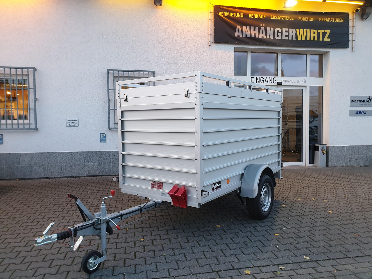 PKW Anhänger Koch Aluline 4.13 Deckel Hecktür Aluboden DV 250x125x125cm 1300kg 100 km/H Modell 23 - Remorque fourgon: photos 1 PKW Anhänger Koch Aluline 4.13 Deckel Hecktür Aluboden DV 250x125x125cm 1300kg 100 km/H Modell 23 - Remorque fourgon: photos 1